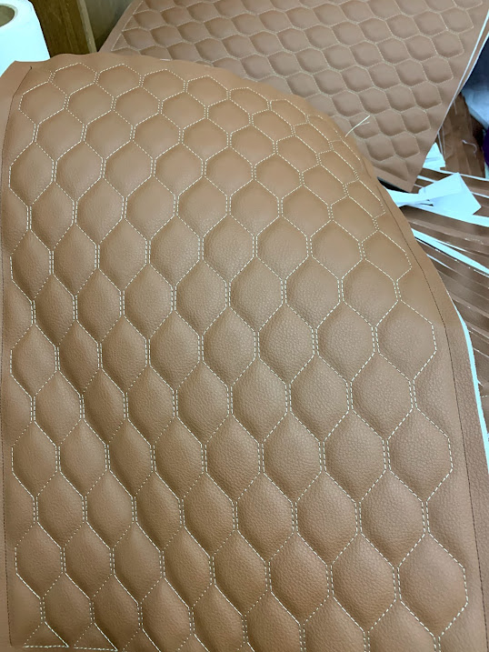 งานปักหนัง ปักหนังแท้ ปักหนังเที่ยม ปักหนังหุ้มเบาะรถ