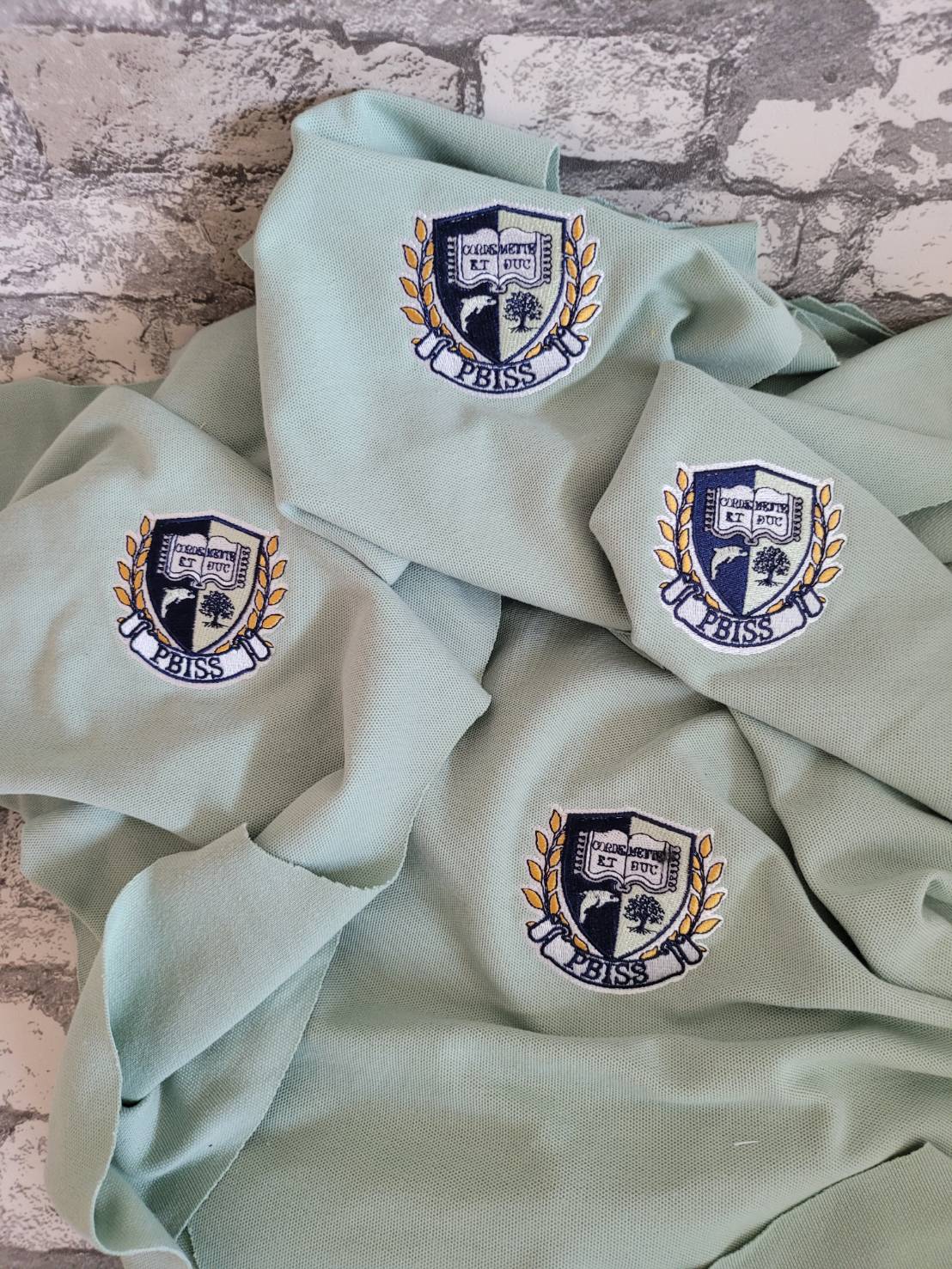 งานปักเสื้อผ้า ตามออร์เดอร์ ปักออร์เยอะ งานปักเสื้อยืด งานปักเสื้อโปโล