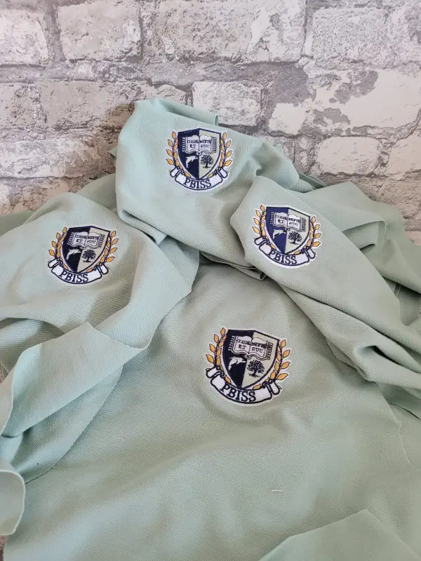 งานปักเสื้อโปโล ปักเสื้อผ้าตามออร์เดอร์ ปักเสื้อยืด ปักเสื้อเด็ก