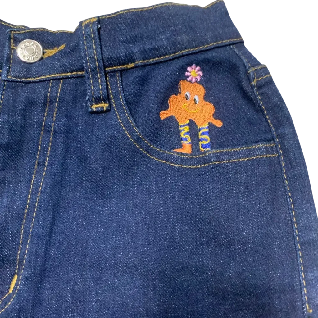 ปักกางเกงยีนส์ กางเกงยีนส์ปักลายนูน รับปักกางเกงยีนส์ 